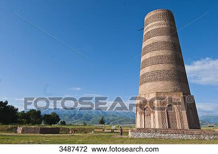 Central Asia, Kyrgyzstan, Chuy province, Burana Tower (11th), archeological site, minaret, remains of the ancient city of Balasagyn View Large Photo Image Stock Image - Central Asia, Kyrgyzstan, Chuy province, Burana Tower (11th), archeological site, minaret, remains of the ancient city of Balasagyn. Fotosearch