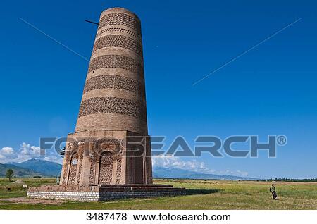 Central Asia, Kyrgyzstan, Chuy province, Burana Tower (11th), archeological site, minaret, remains of the ancient city of Balasagyn View Large Photo Image Stock Photo - Central Asia, Kyrgyzstan, Chuy province, Burana Tower (11th), archeological site, minaret, remains of the ancient city of Balasagyn. Fotosearch