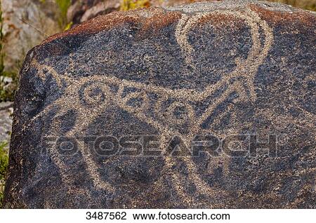 Central Asia, Kyrgyzstan, Issyk Kul Province (Ysyk-Kl), Issyk Kul Lake, Cholpon Ata, petroglyph depicting a hunting scene with an ibex and a bow hunter (2nd century BC) View Large Photo Image Stock Image - Central Asia, Kyrgyzstan, Issyk Kul Province (Ysyk-Kl), Issyk Kul Lake, Cholpon Ata, petroglyph depicting a hunting scene with an ibex and a bow hunter (2nd century BC). Fotosearch