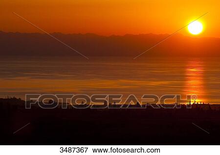 Central Asia, Kyrgyzstan, Issyk Kul Province (Ysyk-Kl), Issyk Kul lake, Barskoon, sunset on the lake View Large Photo Image Stock Photo - Central Asia, Kyrgyzstan, Issyk Kul Province (Ysyk-Kl), Issyk Kul lake, Barskoon, sunset on the lake. Fotosearch