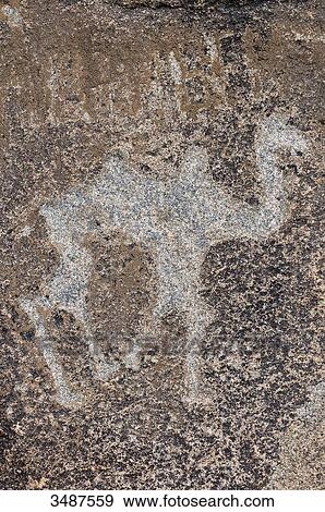 Central Asia, Kyrgyzstan, Issyk Kul Province (Ysyk-Kl), Issyk Kul Lake, Cholpon Ata, petroglyph depicting a hunting scene View Large Photo Image Stock Photo - Central Asia, Kyrgyzstan, Issyk Kul Province (Ysyk-Kl), Issyk Kul Lake, Cholpon Ata, petroglyph depicting a hunting scene. Fotosearch