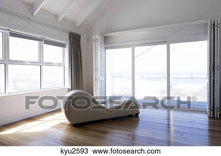 Stock Image - Chaise longue in a room. Fotosearch