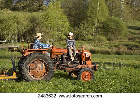 Children on a tractor View Large Photo Image Stock Image - Children on a tractor. Fotosearch