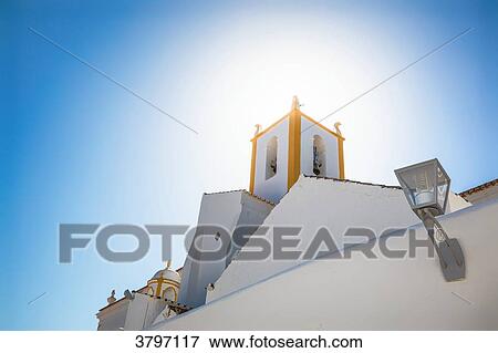 Church tower in Tavira, Algarve region, Portugal View Large Photo Image Stock Photo - Church tower in Tavira, Algarve region, Portugal. Fotosearch