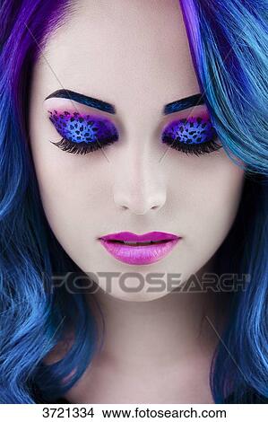 Close up of a pretty girl with leopard makeup View Large Photo Image Picture - Close up of a pretty girl with leopard makeup. Fotosearch