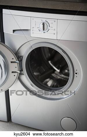 Picture - Close-up of a washing machine. Fotosearch