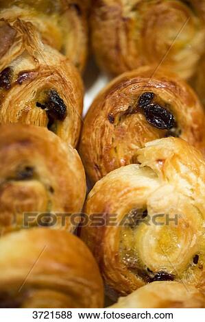 Close-up of buns with raisins View Large Photo Image Stock Photo - Close-up of buns with raisins. Fotosearch