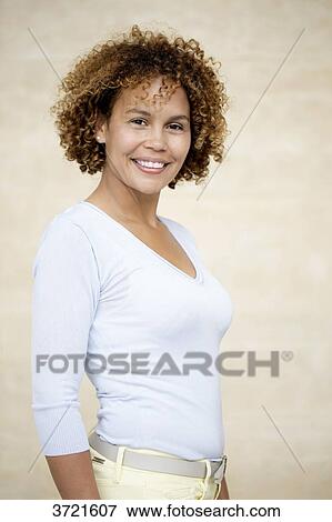 Stock Photo - Close-up of smiling Malagasy woman. Fotosearch