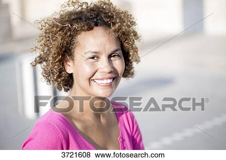 Close-up of smiling Malagasy woman View Large Photo Image Stock Photo - Close-up of smiling Malagasy woman. Fotosearch