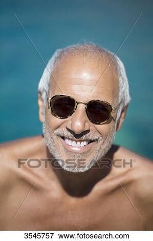 Close-up of smiling man View Large Photo Image Stock Photo - Close-up of smiling man. Fotosearch