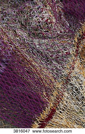 Close-up on a fishing net. View Large Photo Image Stock Photo - Close-up on a fishing net.. Fotosearch