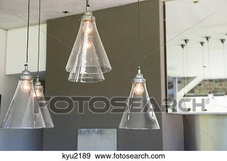 Electric lamps lit up at home View Large Photo Image Stock Photo - Electric lamps lit up at home. Fotosearch