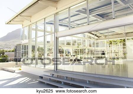 Stock Photography - Entrance area of a hotel viewed from outside. Fotosearch