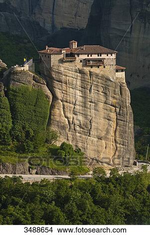 Europe, Grece, Plain of Thessaly, Valley of Penee, World Heritage of UNESCO since 1988, Orthodox Christian monasteries of Meteora perched atop impressive gray rock masses sculpted by erosion, the Roussanou convent View Large Photo Image Picture - Europe, Grece, Plain of Thessaly, Valley of Penee, World Heritage of UNESCO since 1988, Orthodox Christian monasteries of Meteora perched atop impressive gray rock masses sculpted by erosion, the Roussanou convent. Fotosearch