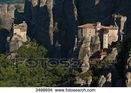 Europe, Grece, Plain of Thessaly, Valley of Penee, World Heritage of UNESCO since 1988, Orthodox Christian monasteries of Meteora perched atop impressive gray rock masses sculpted by erosion View Large Photo Image Picture - Europe, Grece, Plain of Thessaly, Valley of Penee, World Heritage of UNESCO since 1988, Orthodox Christian monasteries of Meteora perched atop impressive gray rock masses sculpted by erosion. Fotosearch