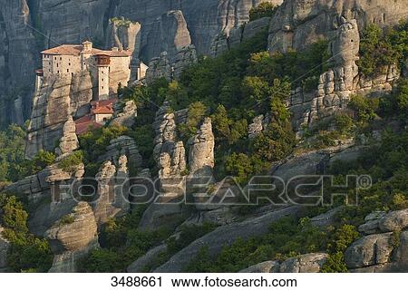 Europe, Grece, Plain of Thessaly, Valley of Penee, World Heritage of UNESCO since 1988, Orthodox Christian monasteries of Meteora perched atop impressive gray rock masses sculpted by erosion, the Roussanou convent View Large Photo Image Stock Image - Europe, Grece, Plain of Thessaly, Valley of Penee, World Heritage of UNESCO since 1988, Orthodox Christian monasteries of Meteora perched atop impressive gray rock masses sculpted by erosion, the Roussanou convent. Fotosearch