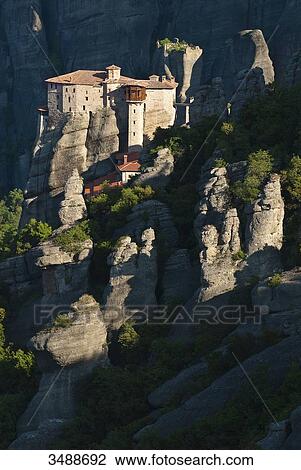 Europe, Grece, Plain of Thessaly, Valley of Penee, World Heritage of UNESCO since 1988, Orthodox Christian monasteries of Meteora perched atop impressive gray rock sculpted by erosion, the Roussanou convent View Large Photo Image Stock Image - Europe, Grece, Plain of Thessaly, Valley of Penee, World Heritage of UNESCO since 1988, Orthodox Christian monasteries of Meteora perched atop impressive gray rock sculpted by erosion, the Roussanou convent. Fotosearch