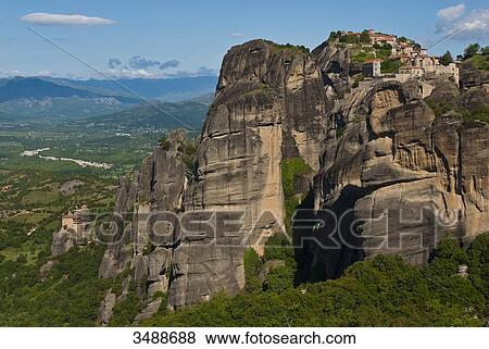 Europe, Grece, Plain of Thessaly, Valley of Penee, World Heritage of UNESCO since 1988, Orthodox Christian monasteries of Meteora perched atop impressive gray rock masses sculpted by erosion View Large Photo Image Stock Photo - Europe, Grece, Plain of Thessaly, Valley of Penee, World Heritage of UNESCO since 1988, Orthodox Christian monasteries of Meteora perched atop impressive gray rock masses sculpted by erosion. Fotosearch