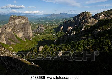 Europe, Grece, Plain of Thessaly, Valley of Penee, World Heritage of UNESCO since 1988, Orthodox Christian monasteries of Meteora perched atop impressive gray rock masses sculpted by erosion View Large Photo Image Stock Photograph - Europe, Grece, Plain of Thessaly, Valley of Penee, World Heritage of UNESCO since 1988, Orthodox Christian monasteries of Meteora perched atop impressive gray rock masses sculpted by erosion. Fotosearch