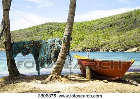 fishing boat and its net, Hope Bay, Bequia, Saint-Vincent et les Grenadines, West Indies View Large Photo Image Stock Photography - fishing boat and its net, Hope Bay, Bequia, Saint-Vincent et les Grenadines, West Indies. Fotosearch