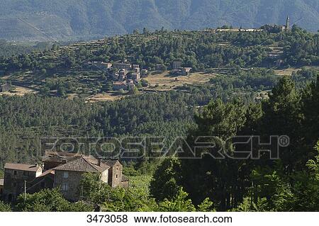 Stock Photo - France, Ardeche, landscape, panorama of the Thines Valley, church, house. Fotosearch