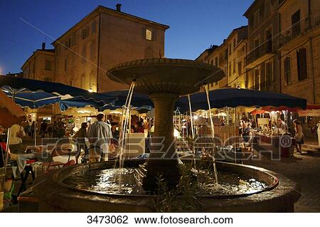 France, Ardeche, Les Vans, the night market, the central square with its fountain View Large Photo Image Stock Image - France, Ardeche, Les Vans, the night market, the central square with its fountain. Fotosearch