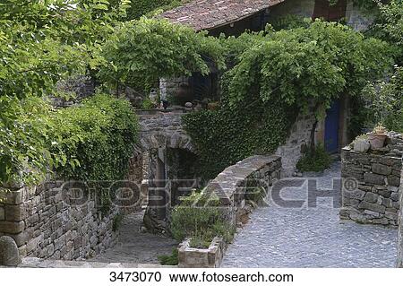 France, Ardeche, the village of Naves, small street, house View Large Photo Image Stock Image - France, Ardeche, the village of Naves, small street, house. Fotosearch