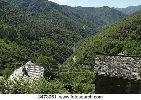 France, Ardeche, Thines, panorama of the perched village of Thines with its mountains View Large Photo Image Stock Image - France, Ardeche, Thines, panorama of the perched village of Thines with its mountains. Fotosearch