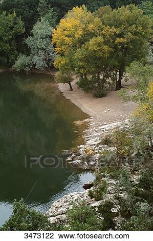 Stock Image - France, Ardeche, Vallon Pont d'arc, Ardeche gorges, Pont d'Arc on the Ardeche river.. Fotosearch