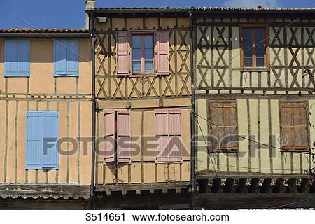France, Ariege, three medieval half-timbered facades in Mirepoix. Green and purple shutters View Large Photo Image Stock Image - France, Ariege, three medieval half-timbered facades in Mirepoix. Green and purple shutters. Fotosearch