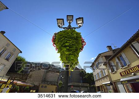 France, Ariege, triple street lamp and its waterfall of leaves in Foix View Large Photo Image Stock Image - France, Ariege, triple street lamp and its waterfall of leaves in Foix. Fotosearch
