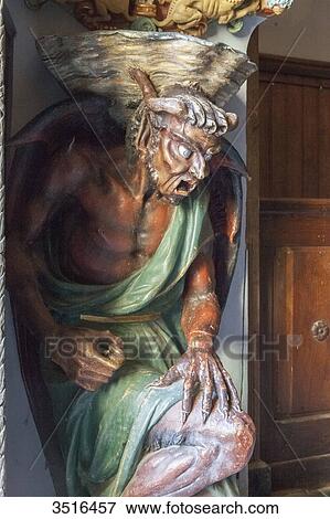 France, Aude, Rennes-le-Chateau, the devil supporting the stoup, famous symbol of the village, at the entrance of the church View Large Photo Image Stock Photo - France, Aude, Rennes-le-Chateau, the devil supporting the stoup, famous symbol of the village, at the entrance of the church. Fotosearch