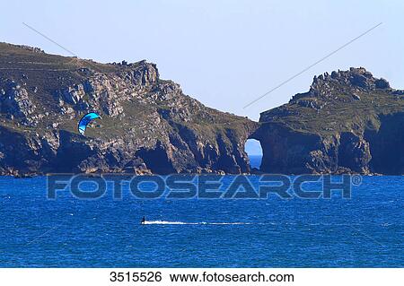 France, Brittany, Crozon Peninsula. Point de Dinan. Kite surfer. View Large Photo Image Stock Photograph - France, Brittany, Crozon Peninsula. Point de Dinan. Kite surfer.. Fotosearch