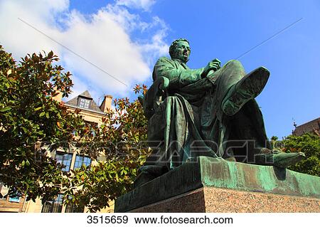 France, Brittany. Quimper. Old town. Statue of Rene-Theophile-Hyacinthe Laennec on Saint-Corentin square. Sculptor: Eugene-Louis Lequesne. View Large Photo Image Stock Photo - France, Brittany. Quimper. Old town. Statue of Rene-Theophile-Hyacinthe Laennec on Saint-Corentin square. Sculptor: Eugene-Louis Lequesne.. Fotosearch