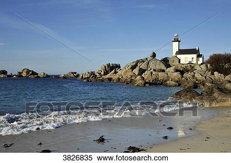 Stock Photography - France, Brittany region, Finistere department, sea side at Brignogan-Plages city, lighthouse and beach at the tip of Pontusval.. Fotosearch