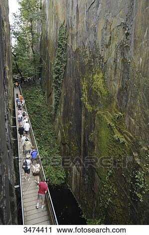 France, Center of France, Donzenac, the tails of Travassac, tourists wandering around in slate quarries View Large Photo Image Stock Image - France, Center of France, Donzenac, the tails of Travassac, tourists wandering around in slate quarries. Fotosearch