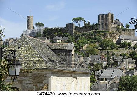 Stock Image - France, Center of France, Turenne, general view of the village of Turenne with the remnants of the castle and the tower of Treasury. The castle has been dismantled by order of King Louis XV. Fotosearch