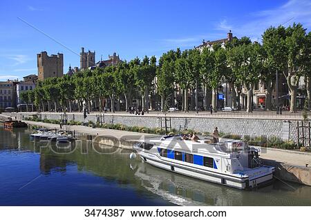 France, central Southern France, Narbonne. Canal de la Robine View Large Photo Image Stock Photo - France, central Southern France, Narbonne. Canal de la Robine. Fotosearch