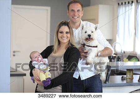 France, couple with child and West-highland dog View Large Photo Image Stock Photo - France, couple with child and West-highland dog. Fotosearch