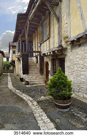 France, Dordogne, vertical view of a medieval street Issigeac View Large Photo Image Stock Image - France, Dordogne, vertical view of a medieval street Issigeac. Fotosearch