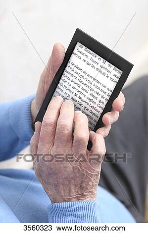 France, elderly and e-book View Large Photo Image Stock Image - France, elderly and e-book. Fotosearch