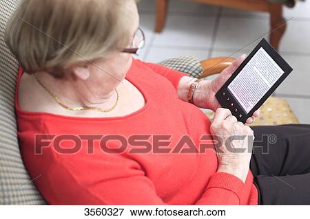 France, elderly and e-book View Large Photo Image Stock Photo - France, elderly and e-book. Fotosearch