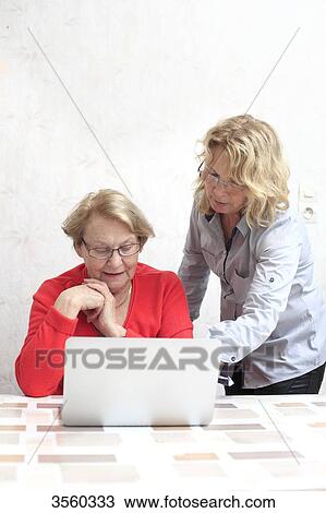 Stock Image - France, elderly and new technologies. Fotosearch