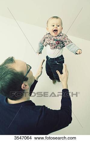France, father playing with his son View Large Photo Image Picture - France, father playing with his son. Fotosearch