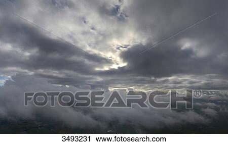 France, flying between two layers of clouds above the Vendee countryside View Large Photo Image Stock Image - France, flying between two layers of clouds above the Vendee countryside. Fotosearch
