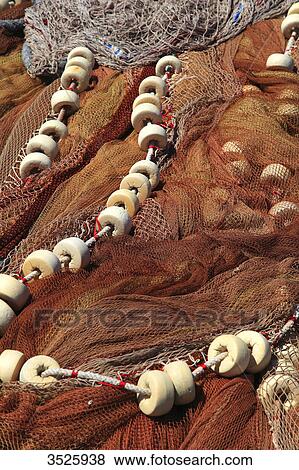 France, French Basque Country, Pyrenees-Atlantiques, Saint Jean de Luz, closeup of fishing nets View Large Photo Image Stock Photo - France, French Basque Country, Pyrenees-Atlantiques, Saint Jean de Luz, closeup of fishing nets. Fotosearch