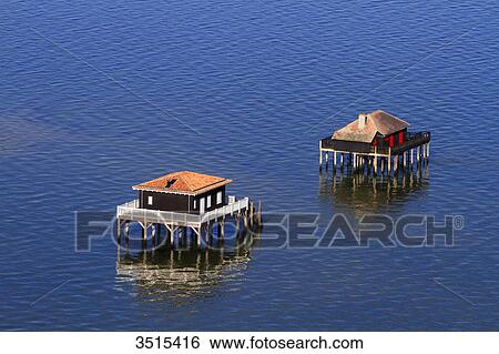 France, Gironde. Arcachon Bay. Bird Island. Cabin built on stilts. View Large Photo Image Stock Photograph - France, Gironde. Arcachon Bay. Bird Island. Cabin built on stilts.. Fotosearch