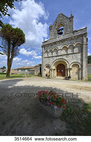 Picture - France, Gironde, vertical view of the Church of Tauriac. Planter in the foreground. Fotosearch