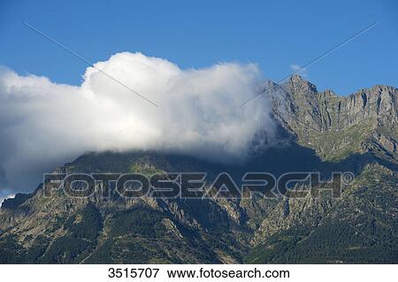 France. Hautes Alpes. Landscape of the Champsaur. Cloud on a mountain in summer View Large Photo Image Stock Photo - France. Hautes Alpes. Landscape of the Champsaur. Cloud on a mountain in summer. Fotosearch