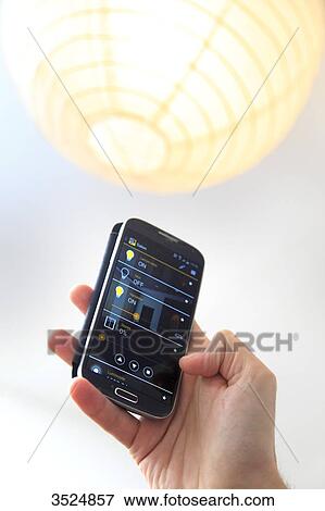 France, house automation starting from a smartphone View Large Photo Image Stock Photo - France, house automation starting from a smartphone. Fotosearch